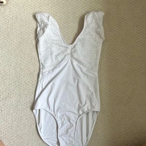 White leotard with lace top and small cap sleeve